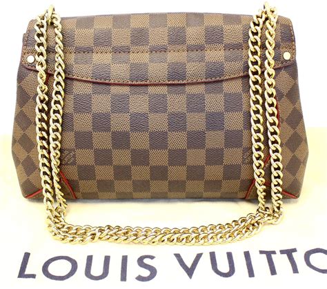 louis vuitton shoulder clutch.